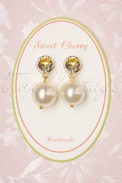 Stijlvolle Pareloorbellen In Ivoor