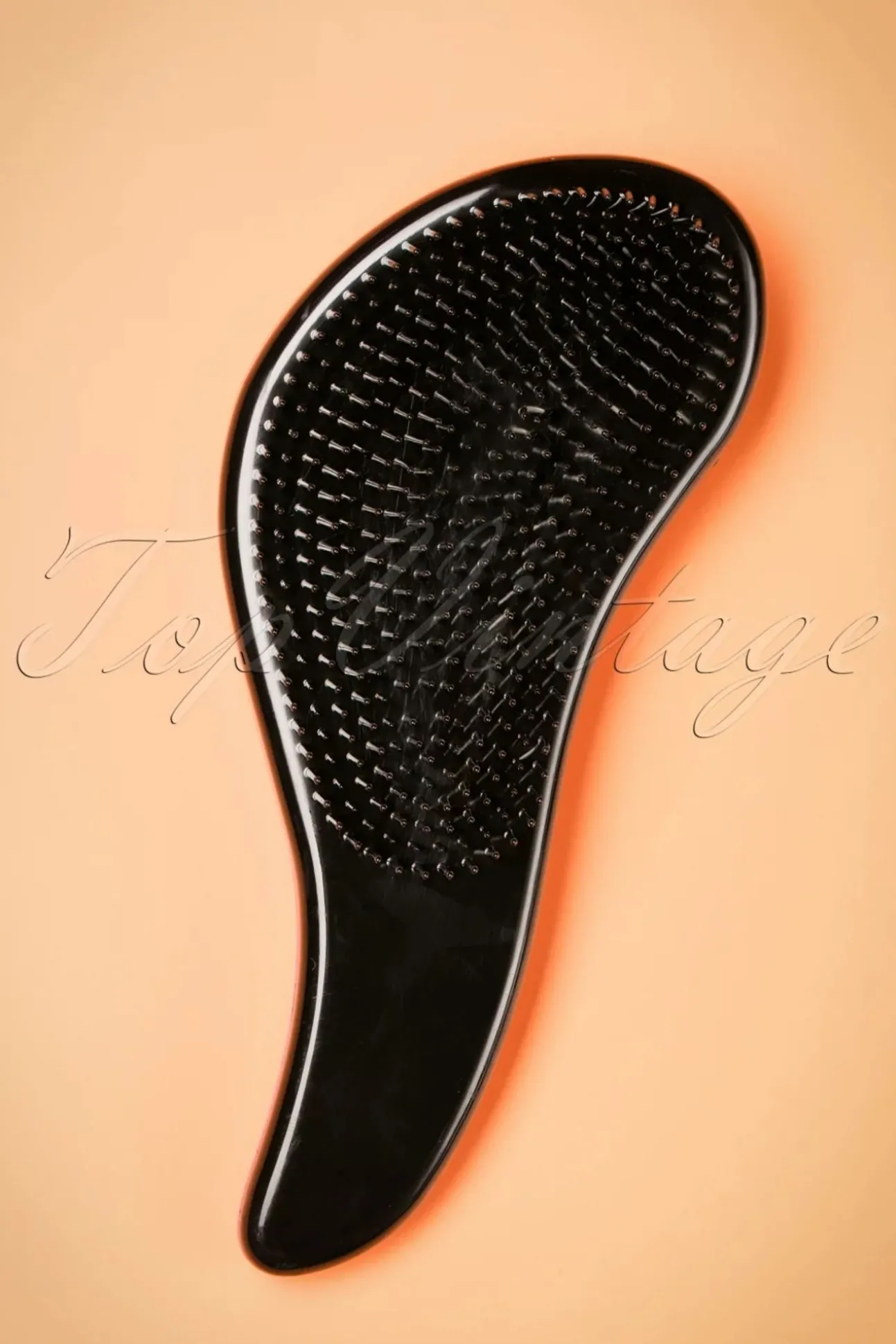 Vintage Haarstyling: Miracle Curl Brush In Roze